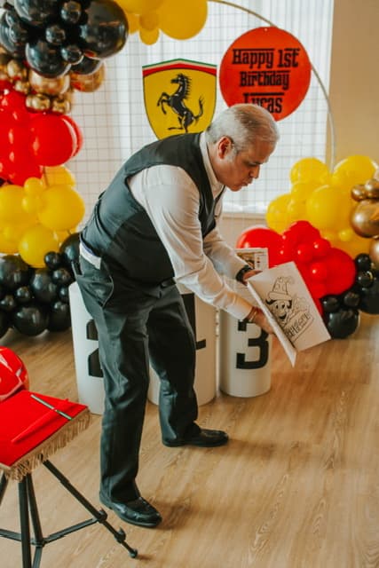 Frank performing at a birthday party
