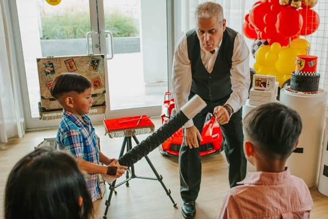 A child delighted during a magic trick
